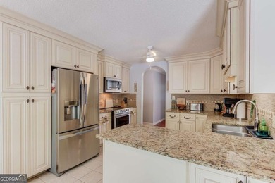 Welcome home to this beautifully maintained 3-bedroom, 2-bath - photo 12