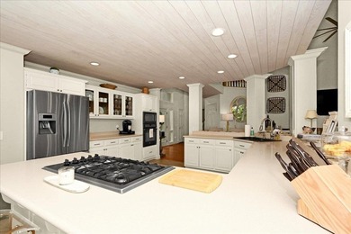 WONDERFUL HOME NESTLED IN THE WOODS ON ONE OF THE FINEST GOLF - photo 12