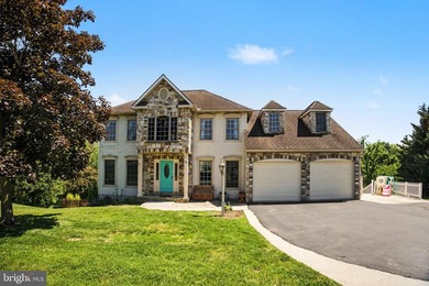 Welcome to 15 Bullrush Landing, a meticulously maintained move - photo 2