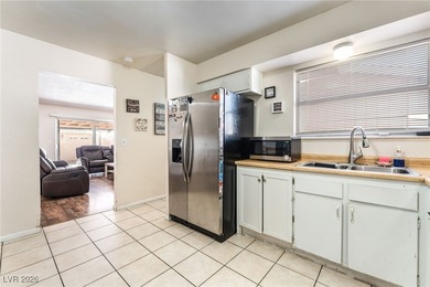 Corner lot with no HOA! This single-family home features an open