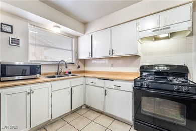 Corner lot with no HOA! This single-family home features an open