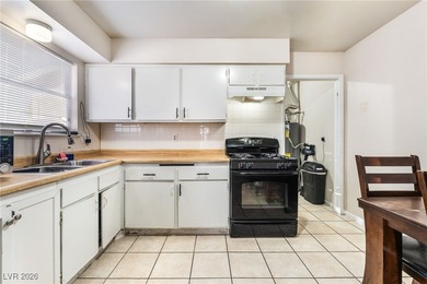 Corner lot with no HOA! This single-family home features an open