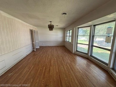 Nice tree shaded lot, oversized home offering living room and - photo 5