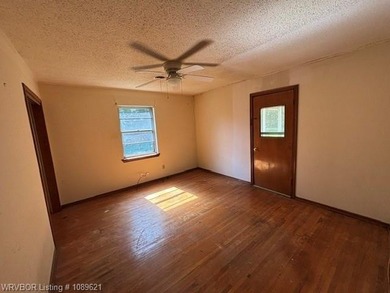 Nice tree shaded lot, oversized home offering living room and - photo 8