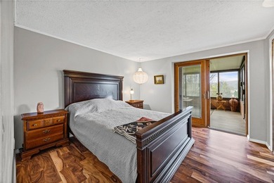 Set on 3 fully fenced acres with breathtaking year-round lake - photo 20