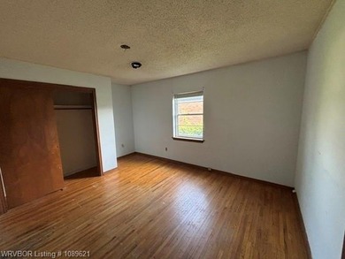 Nice tree shaded lot, oversized home offering living room and - photo 10
