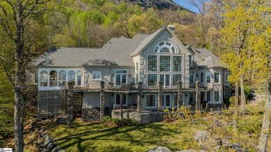 This European-inspired mountain estate is defined by a rare - photo 2