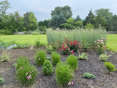 Set on 3 fully fenced acres with breathtaking year-round lake - photo 45