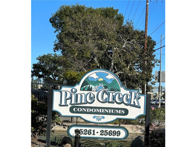 Welcome to this beautifully updated end-unit condo in the - photo 1