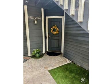 Welcome to this beautifully updated end-unit condo in the - photo 2
