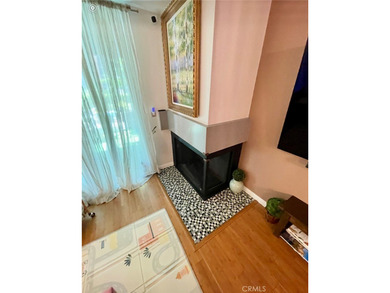 Welcome to this beautifully updated end-unit condo in the - photo 7