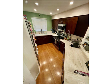 Welcome to this beautifully updated end-unit condo in the - photo 8