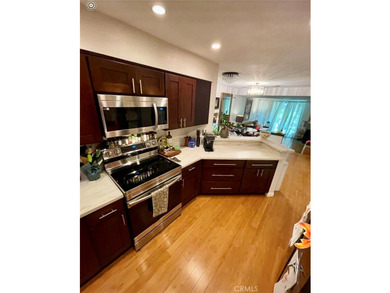 Welcome to this beautifully updated end-unit condo in the - photo 9