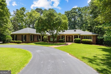 Exceptional custom lakefront home situated on 1.93 private acres - photo 1