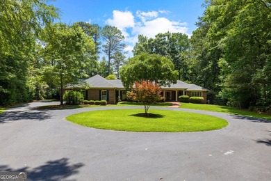 Exceptional custom lakefront home situated on 1.93 private acres - photo 2