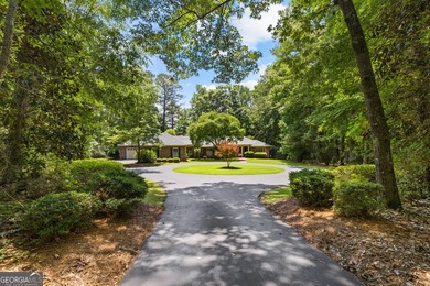 Exceptional custom lakefront home situated on 1.93 private acres - photo 3