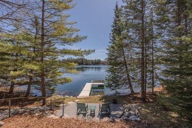 Set on 219' of shoreline along the striking blue-green waters of - photo 11
