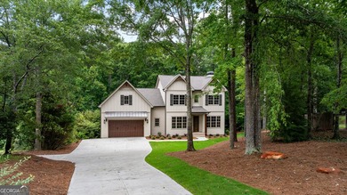 NEW CONSTRUCTION...Lakefront and nestled among the trees - photo 3