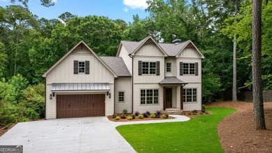 NEW CONSTRUCTION...Lakefront and nestled among the trees - photo 4