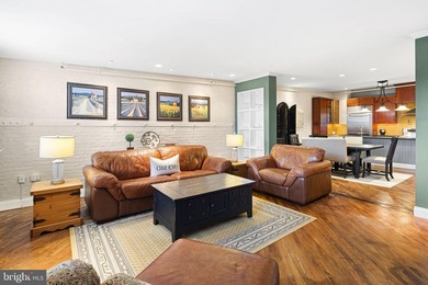 This beautifully updated penthouse offers a unique blend of - photo 12