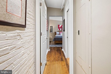 This beautifully updated penthouse offers a unique blend of - photo 16