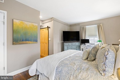 This beautifully updated penthouse offers a unique blend of - photo 18
