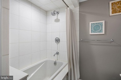 This beautifully updated penthouse offers a unique blend of - photo 25