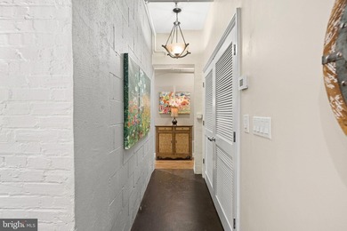 This beautifully updated penthouse offers a unique blend of - photo 26