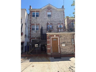 Introducing a beautifully maintained two-family home situated in - photo 1