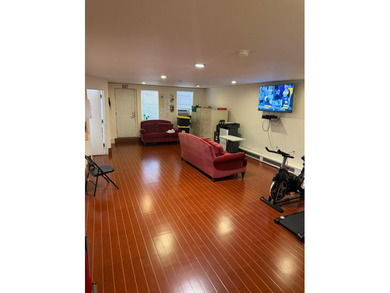 Introducing a beautifully maintained two-family home situated in - photo 7