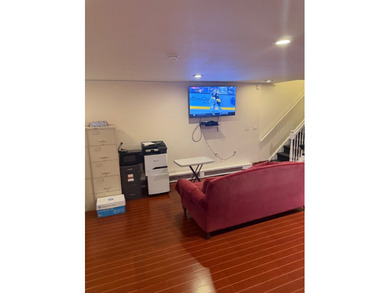 Introducing a beautifully maintained two-family home situated in - photo 8