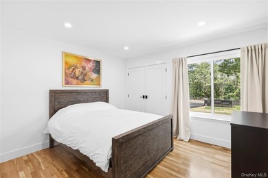 Thoughtfully renovated Southampton property set behind an - photo 12