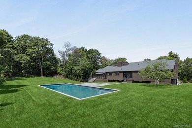 Thoughtfully renovated Southampton property set behind an - photo 17