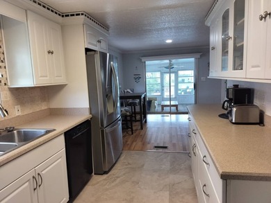 Step into this beautifully remodeled, fully furnished 2-bedroom - photo 8
