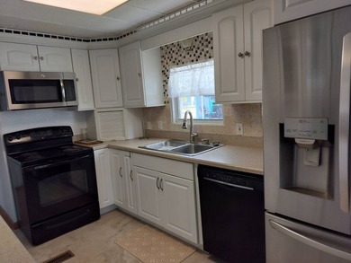 Step into this beautifully remodeled, fully furnished 2-bedroom - photo 9
