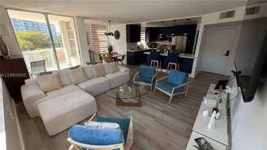 Beautifully updated and move-in ready 2/2 unit in the highly - photo 2