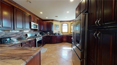 Nestled in the heart of Dyker Heights, this corner detached - photo 9