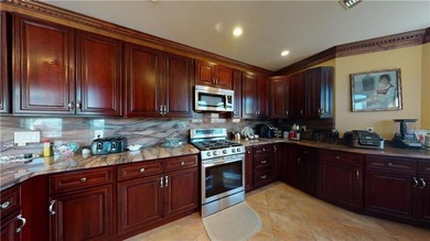 Nestled in the heart of Dyker Heights, this corner detached - photo 10
