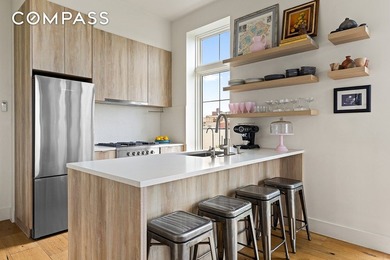 Perched on the top floor of an intimate boutique building by - photo 2