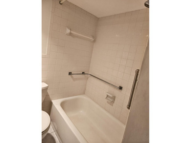 FIRST FLOOR! CORNER UNIT! NEW ROOF! Make this 2 bedroom, 1 bath - photo 12