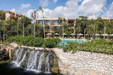 Tucked away in the lush embrace of Aldea Zama, Aflora is more - photo 22