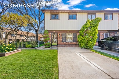 This beautifully maintained home is located in the highly - photo 1