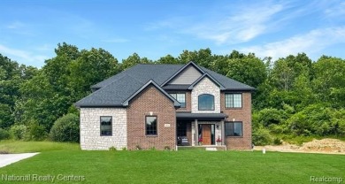 Lake Home For Sale in Oxford, Michigan