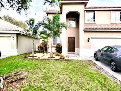 Lake Home For Sale in Coconut Creek, Florida