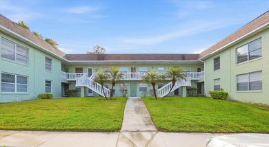 Welcome to this beautifully renovated corner-unit condo in the - photo 1