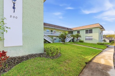 Welcome to this beautifully renovated corner-unit condo in the - photo 2