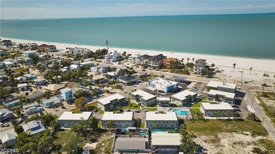 Experience the ultimate beachside lifestyle in this beautifully - photo 11