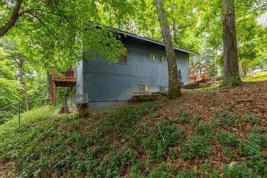 Tucked among the trees near Beaver Lake, this beautifully - photo 33