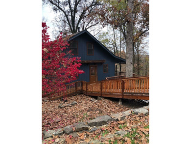 Tucked among the trees near Beaver Lake, this beautifully - photo 34
