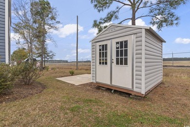 Welcome to Market Village! This welcoming 3-bedroom, 2-bath - photo 11